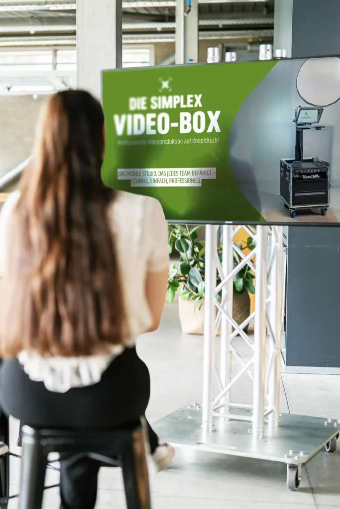 Präsentation vor der Videobox